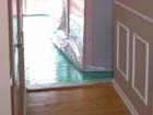 A kitchen floor during mold removal.